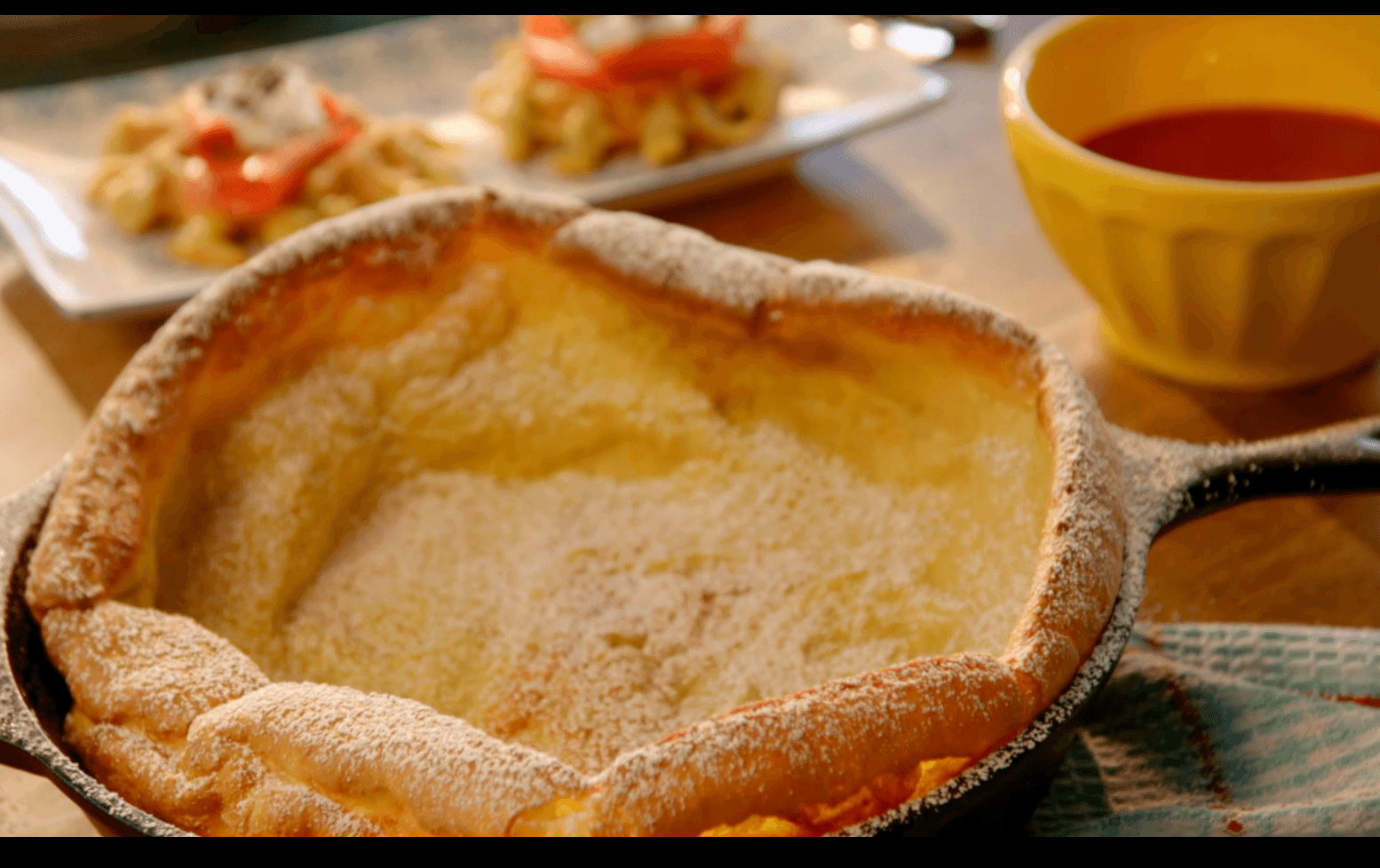 Dutch Baby Pancake with Raspberry-Orange Coulis